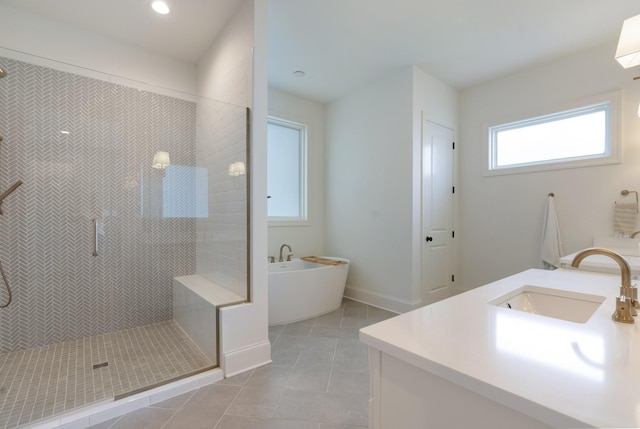 4761 Woodrow Pl, Arrington, TN 37014 - full bath with a soaking tub, vanity, a tile shower, tile patterned floors, and recessed lighting