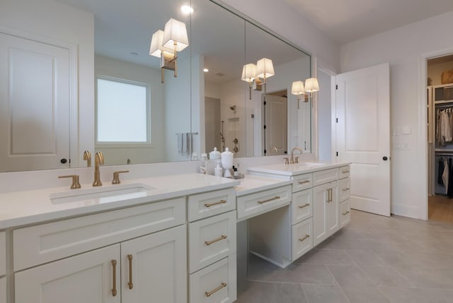 4761 Woodrow Pl, Arrington, TN 37014 - bathroom featuring double vanity, a shower, tile patterned floors, and a spacious closet