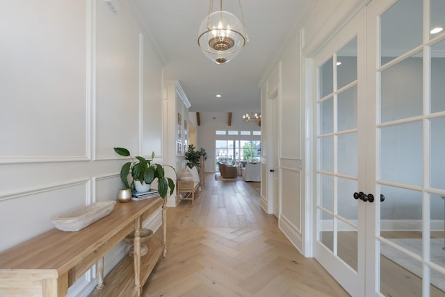 4761 Woodrow Pl, Arrington, TN 37014 - corridor featuring a decorative wall, a chandelier, and french doors