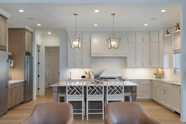 4761 Woodrow Pl, Arrington, TN 37014 - kitchen with a sink, stainless steel fridge, freestanding refrigerator, light countertops, and recessed lighting