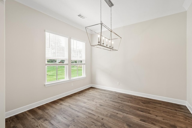 7503 Old Nashville Rd, Fairview, TN 37062 - unfurnished dining area with a chandelier and dark wood-style floors