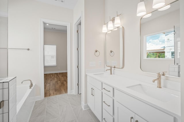 7503 Old Nashville Rd, Fairview, TN 37062 - bathroom featuring double vanity and a bath