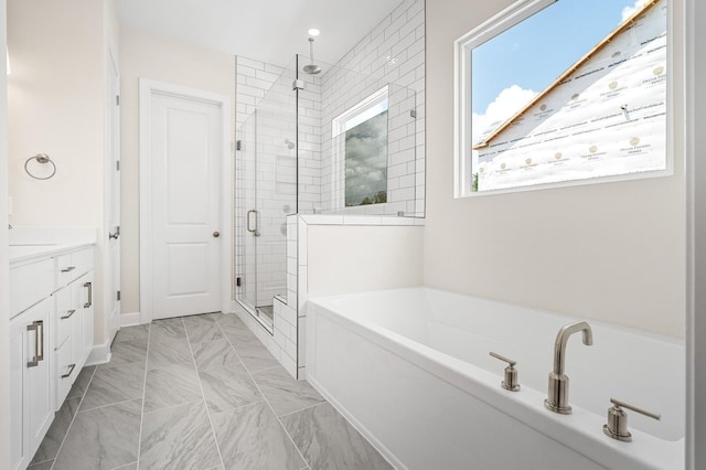 7503 Old Nashville Rd, Fairview, TN 37062 - full bathroom with a garden tub, a shower stall, and vanity