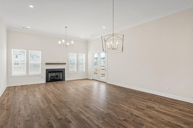 7503 Old Nashville Rd, Fairview, TN 37062 - unfurnished living room featuring a chandelier, dark wood-type flooring, recessed lighting, ornamental molding, and a fireplace