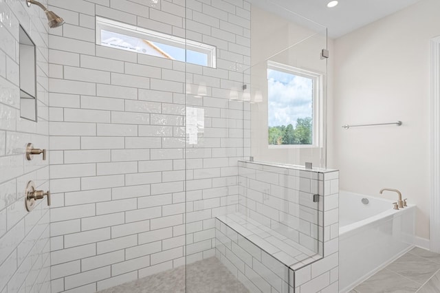 7503 Old Nashville Rd, Fairview, TN 37062 - bathroom with a stall shower, a bath, and marble finish flooring
