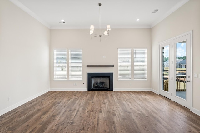 7503 Old Nashville Rd, Fairview, TN 37062 - unfurnished living room with wood finished floors, crown molding, a chandelier, and a fireplace