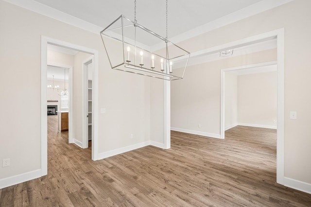 7503 Old Nashville Rd, Fairview, TN 37062 - unfurnished dining area with a chandelier and wood finished floors