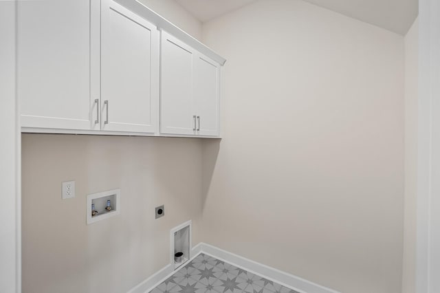 7503 Old Nashville Rd, Fairview, TN 37062 - laundry area with hookup for an electric dryer, cabinet space, washer hookup, and light flooring