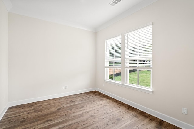 7503 Old Nashville Rd, Fairview, TN 37062 - unfurnished room featuring wood finished floors and crown molding