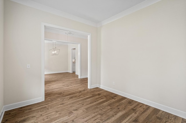 7503 Old Nashville Rd, Fairview, TN 37062 - spare room with a chandelier, wood finished floors, and ornamental molding