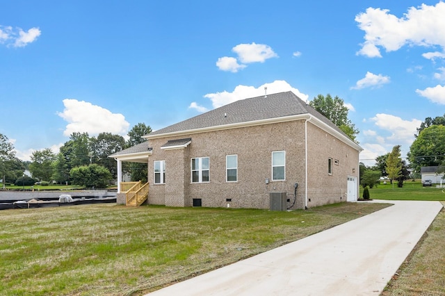 7503 Old Nashville Rd, Fairview, TN 37062 - view of side of home with a lawn, driveway, crawl space, brick siding, and a shingled roof
