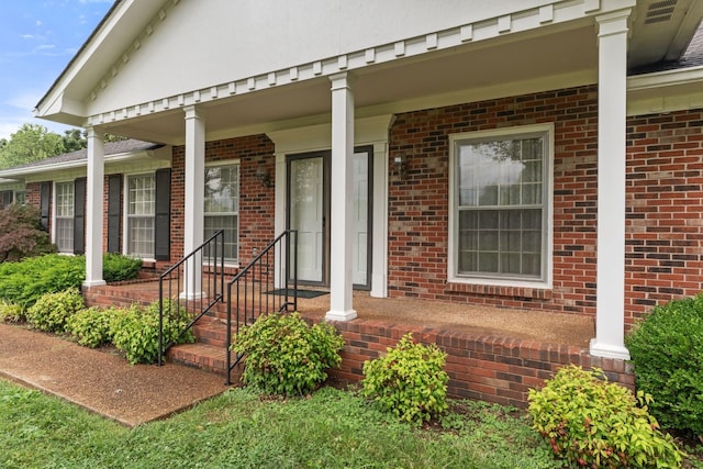 7125 Bidwell Rd, Joelton, TN 37080 - view of exterior entry featuring brick siding and covered porch