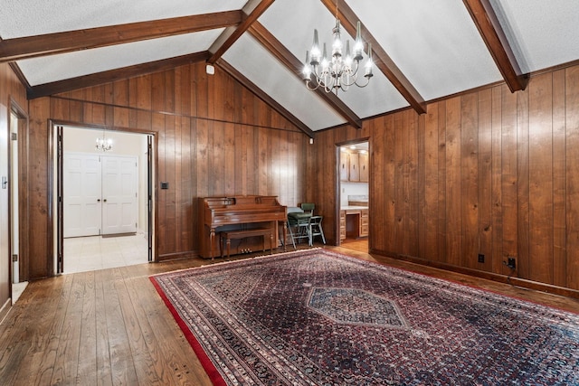 7125 Bidwell Rd, Joelton, TN 37080 - living area featuring a chandelier, wood-type flooring, and wooden walls