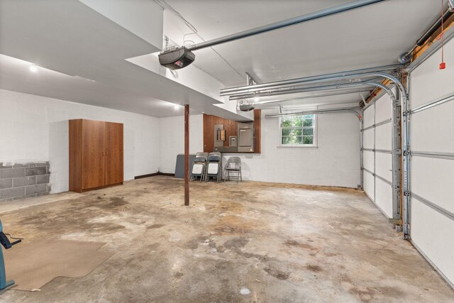 7125 Bidwell Rd, Joelton, TN 37080 - garage with a garage door opener and concrete block wall