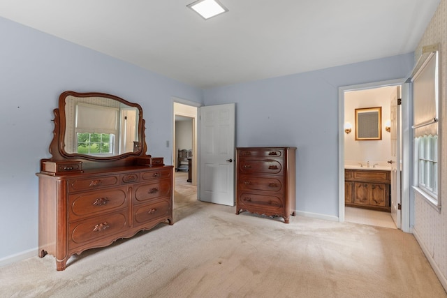 7125 Bidwell Rd, Joelton, TN 37080 - bedroom with light colored carpet, ensuite bath, and baseboards