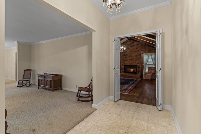 7125 Bidwell Rd, Joelton, TN 37080 - entrance foyer featuring a chandelier, crown molding, a brick fireplace, baseboards, and light colored carpet