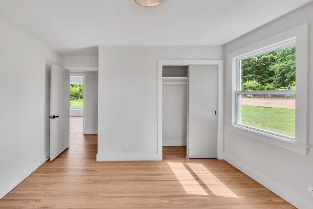 1192 Dalemere Dr, Nashville, TN 37207 - unfurnished bedroom featuring light wood-type flooring, baseboards, and a closet