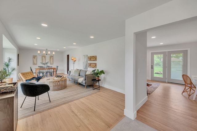 1192 Dalemere Dr, Nashville, TN 37207 - living area with light wood finished floors, recessed lighting, a chandelier, and baseboards