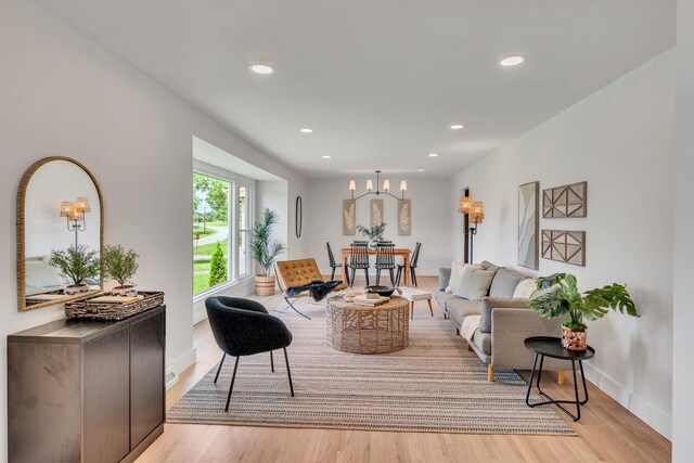 1192 Dalemere Dr, Nashville, TN 37207 - living area featuring light wood-style floors, a chandelier, recessed lighting, and baseboards