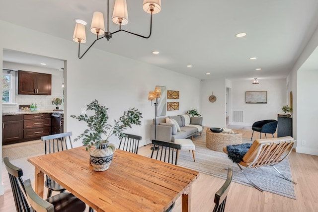 1192 Dalemere Dr, Nashville, TN 37207 - dining space with light wood-type flooring, recessed lighting, baseboards, and a chandelier