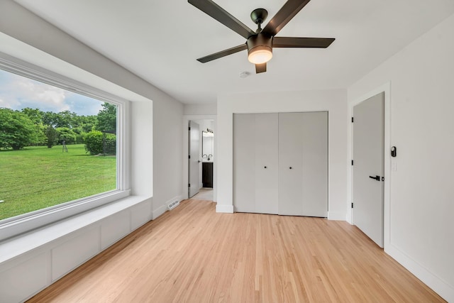 1192 Dalemere Dr, Nashville, TN 37207 - unfurnished bedroom with light wood-style flooring, a closet, baseboards, and ceiling fan