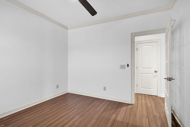 1010 16th Ave S Unit 301, Nashville, TN 37212 - spare room featuring a ceiling fan, crown molding, wood finished floors, and baseboards