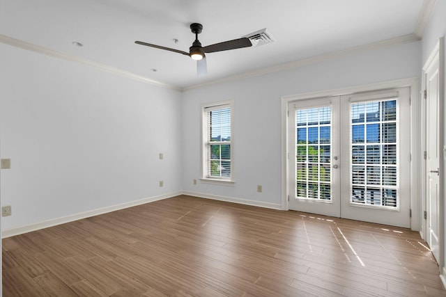 1010 16th Ave S Unit 301, Nashville, TN 37212 - empty room with ornamental molding, a ceiling fan, wood finished floors, and baseboards