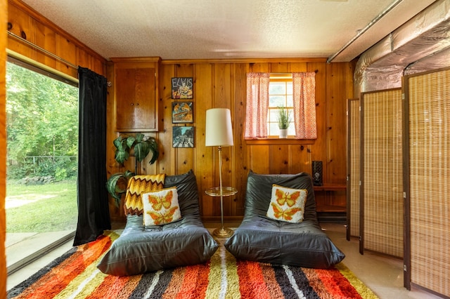 4600 Saunders Ave, Nashville, TN 37216 - living area with wooden walls and a textured ceiling