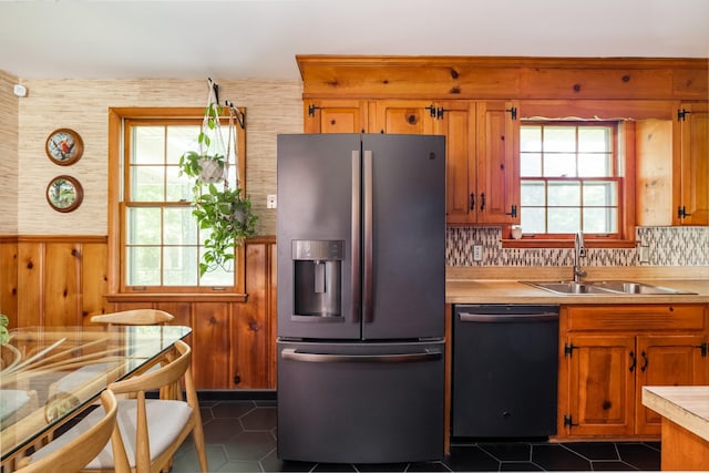 4600 Saunders Ave, Nashville, TN 37216 - kitchen featuring stainless steel fridge, dishwasher, a sink, light countertops, and dark tile patterned flooring