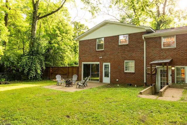 4600 Saunders Ave, Nashville, TN 37216 - back of house featuring a fire pit, a patio area, and brick siding