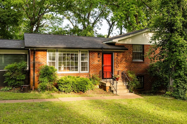 4600 Saunders Ave, Nashville, TN 37216 - view of front of house featuring a front yard and brick siding