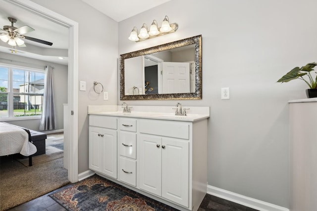 215 Azalea Dr, Oak Grove, KY 42262 - full bathroom featuring double vanity, baseboards, a ceiling fan, and connected bathroom