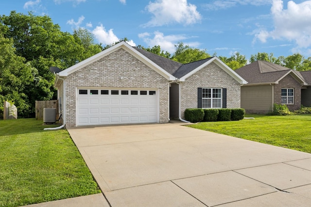 215 Azalea Dr, Oak Grove, KY 42262 - view of front of property featuring an attached garage, brick siding, a front lawn, and concrete driveway