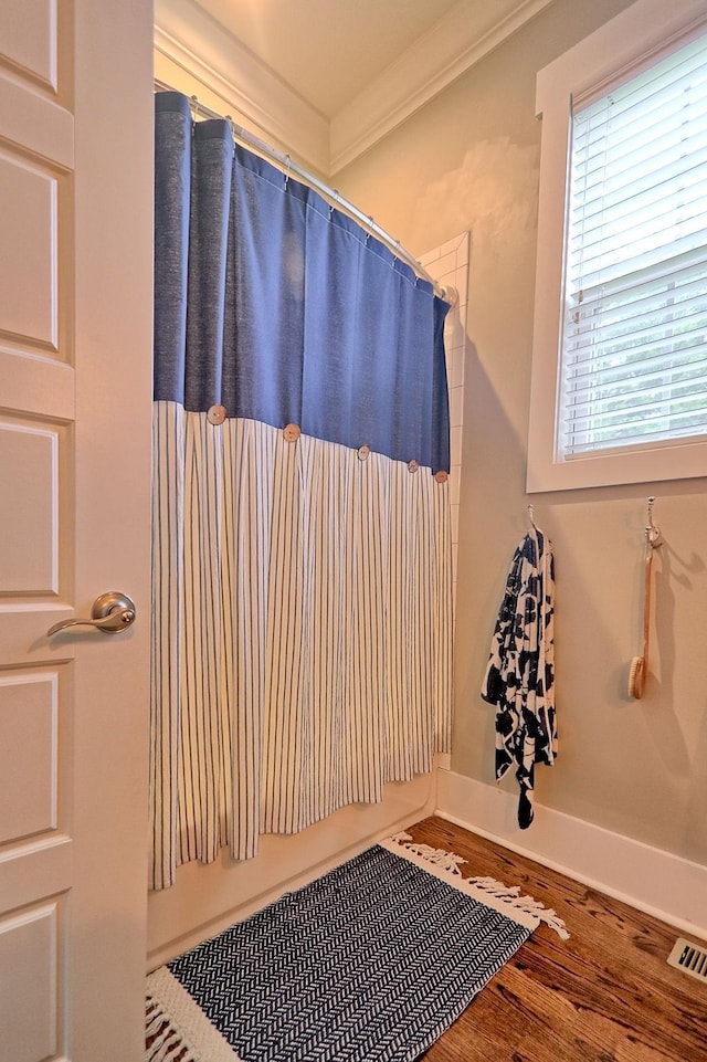 2914 Chasepointe Pl, Columbia, TN 38401 - bathroom with wood finished floors, crown molding, and a shower with curtain