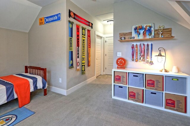 2914 Chasepointe Pl, Columbia, TN 38401 - carpeted bedroom featuring vaulted ceiling, baseboards, and attic access