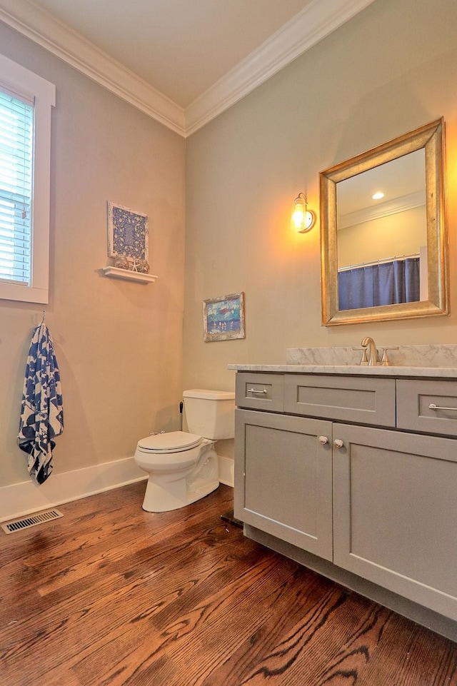 2914 Chasepointe Pl, Columbia, TN 38401 - full bathroom with ornamental molding, wood finished floors, toilet, vanity, and baseboards