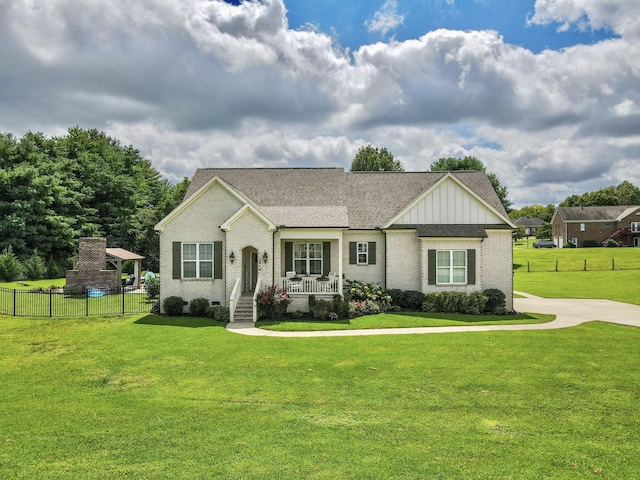 2914 Chasepointe Pl, Columbia, TN 38401 - view of front of house with board and batten siding, brick siding, a porch, and a shingled roof