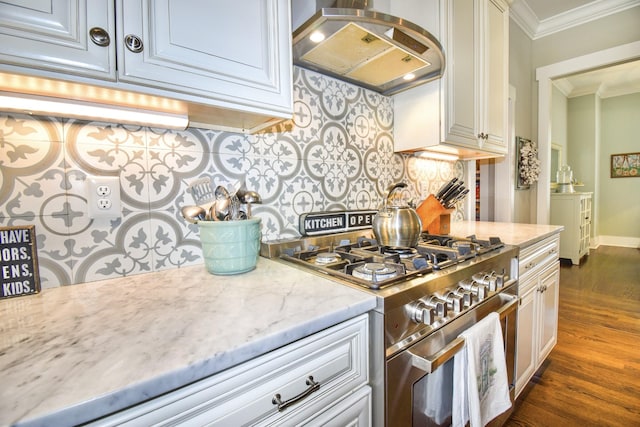 2914 Chasepointe Pl, Columbia, TN 38401 - kitchen with stainless steel gas range, island exhaust hood, crown molding, dark wood-style flooring, and decorative backsplash
