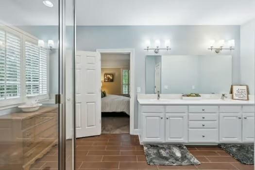 200 Heathstone Cir, Franklin, TN 37069 - ensuite bathroom featuring double vanity and an enclosed shower