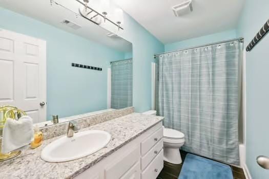 200 Heathstone Cir, Franklin, TN 37069 - full bath with vanity, toilet, and shower / bathtub combination with curtain