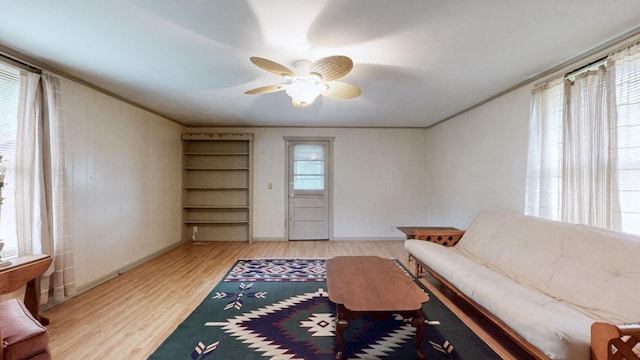 1009 5th Ave W, Springfield, TN 37172 - living room with wood finished floors, a ceiling fan, and baseboards