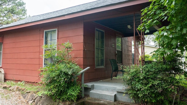 1009 5th Ave W, Springfield, TN 37172 - view of exterior entry with covered porch and roof with shingles
