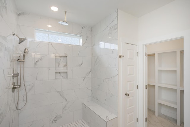 324 Fieldstone Ln, Springfield, TN 37172 - full bathroom with tiled shower, a spacious closet, and marble finish floors