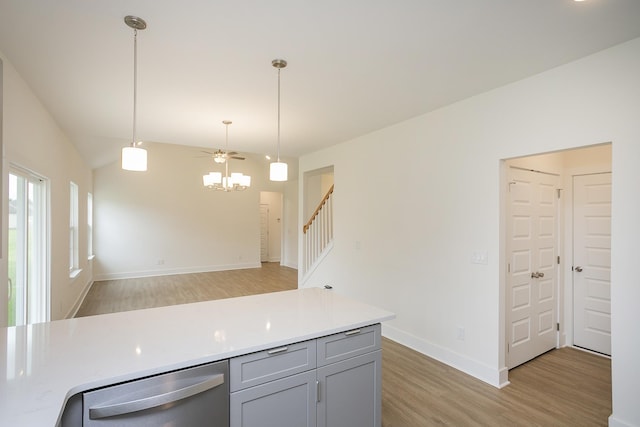 324 Fieldstone Ln, Springfield, TN 37172 - kitchen featuring dishwasher, light wood-style floors, light countertops, and hanging light fixtures