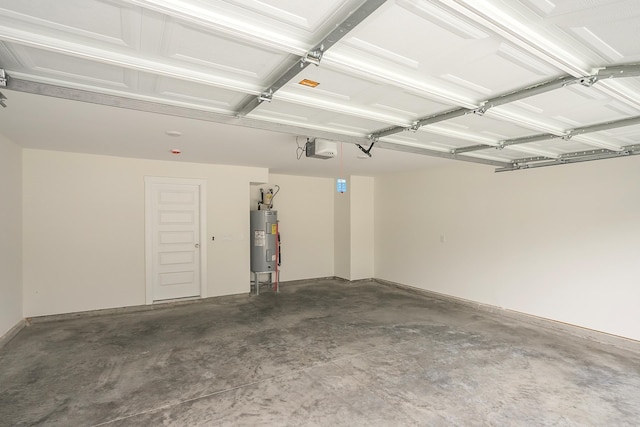 324 Fieldstone Ln, Springfield, TN 37172 - garage with water heater and a garage door opener