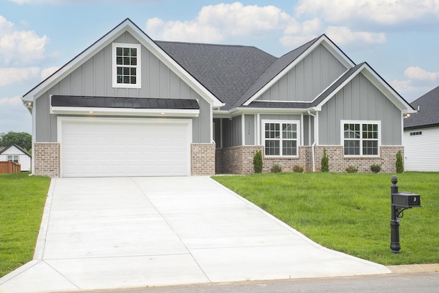 324 Fieldstone Ln, Springfield, TN 37172 - craftsman-style house with brick siding, board and batten siding, driveway, a front lawn, and roof with shingles
