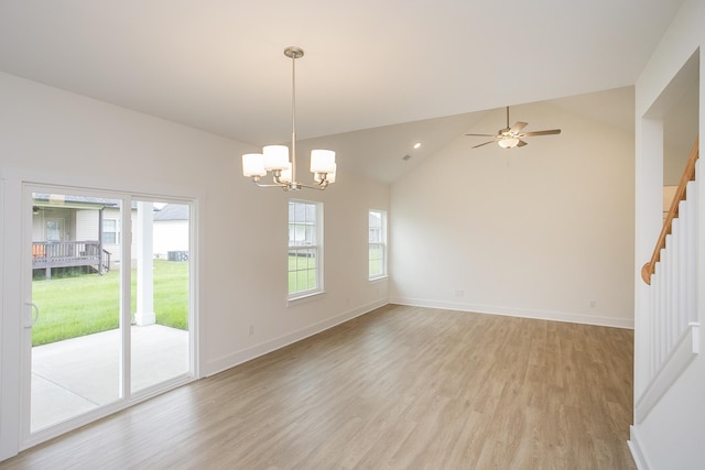 324 Fieldstone Ln, Springfield, TN 37172 - empty room with light wood-type flooring, a chandelier, vaulted ceiling, baseboards, and stairway