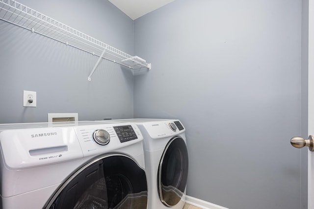 443 Lazy Creek Ln, Nashville, TN 37211 - laundry room with washing machine and clothes dryer and baseboards