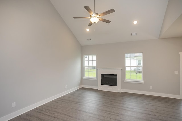 302 Fieldstone Ln, Springfield, TN 37172 - unfurnished living room featuring a ceiling fan, a glass covered fireplace, high vaulted ceiling, dark wood-style floors, and recessed lighting