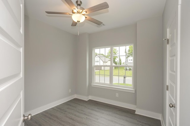 302 Fieldstone Ln, Springfield, TN 37172 - empty room featuring dark wood-type flooring, a ceiling fan, and baseboards